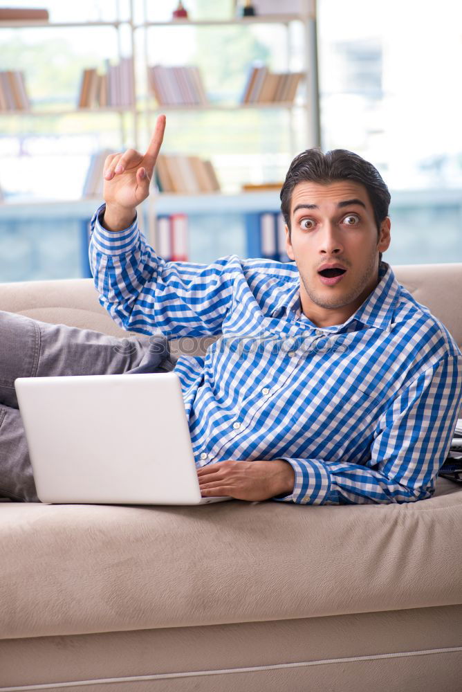 Similar – Image, Stock Photo Young couple reading book on couch at home