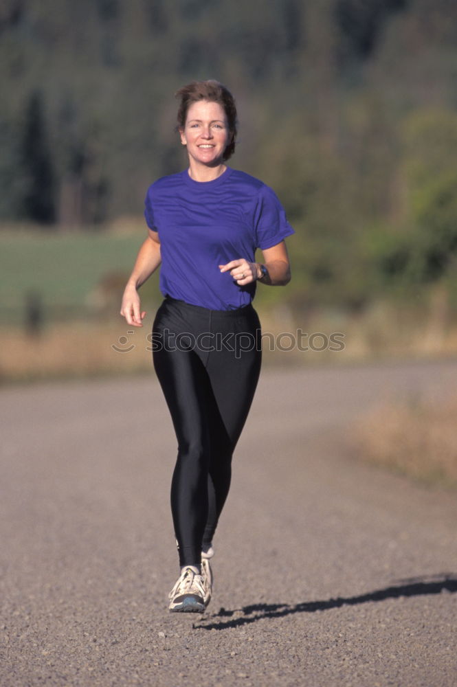 Similar – Image, Stock Photo Concentrated woman running through field