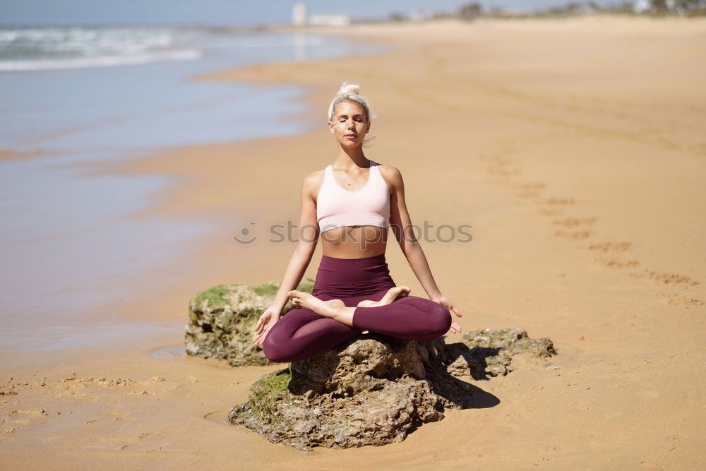 Image, Stock Photo Caucasian blonde woman practicing yoga in the beach