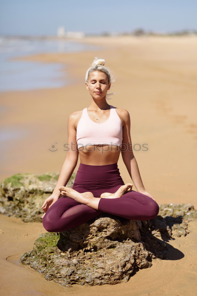 Similar – Image, Stock Photo Caucasian blonde woman practicing yoga in the beach