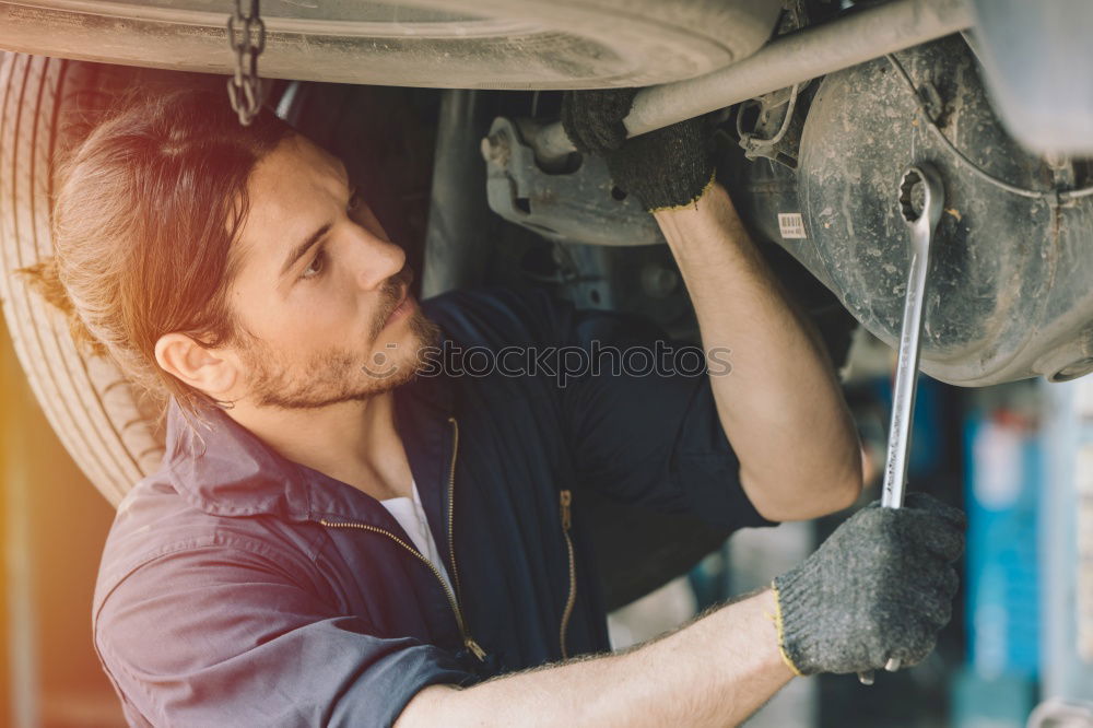 Similar – Professional Car Mechanic working.