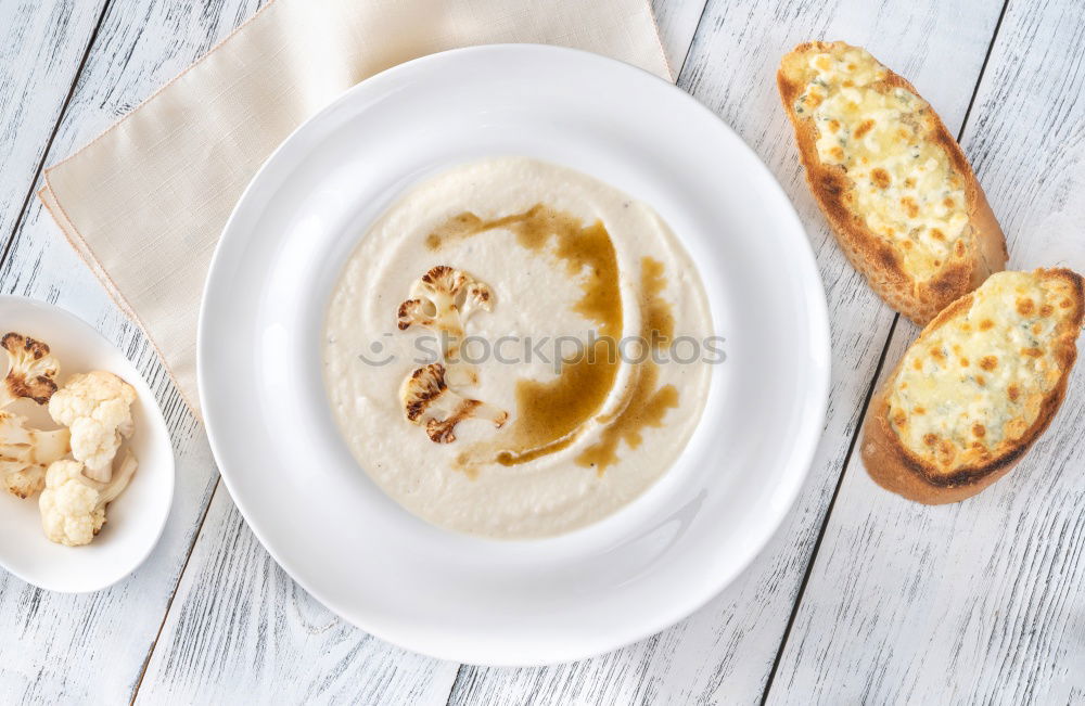 Similar – mushroom soup with champignons