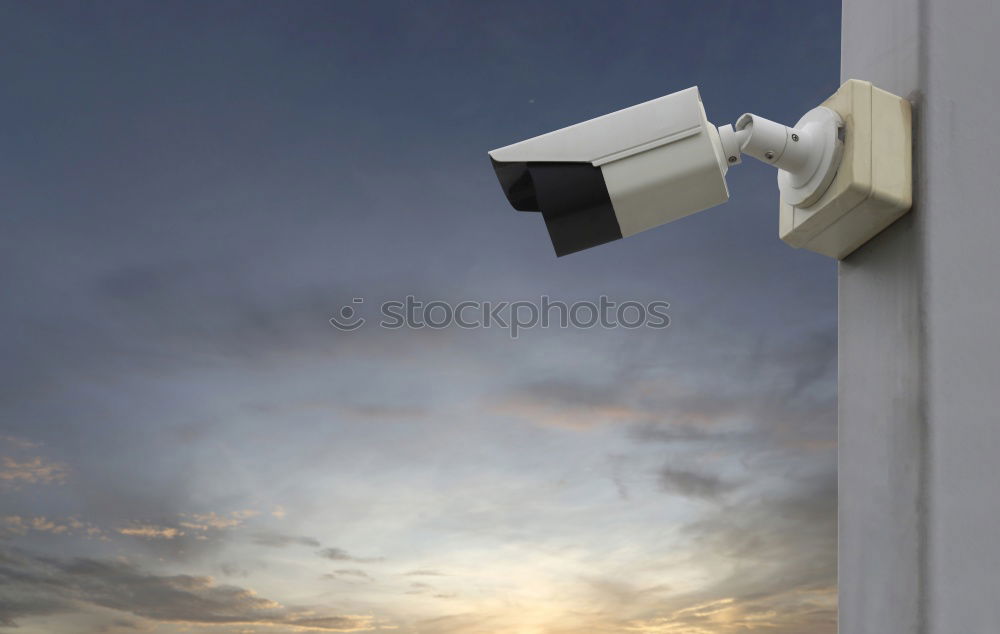 Similar – Industrial Security CCTV Camera installed on metal fence. The camera protects the industrial ground. Blue sky is on the background.