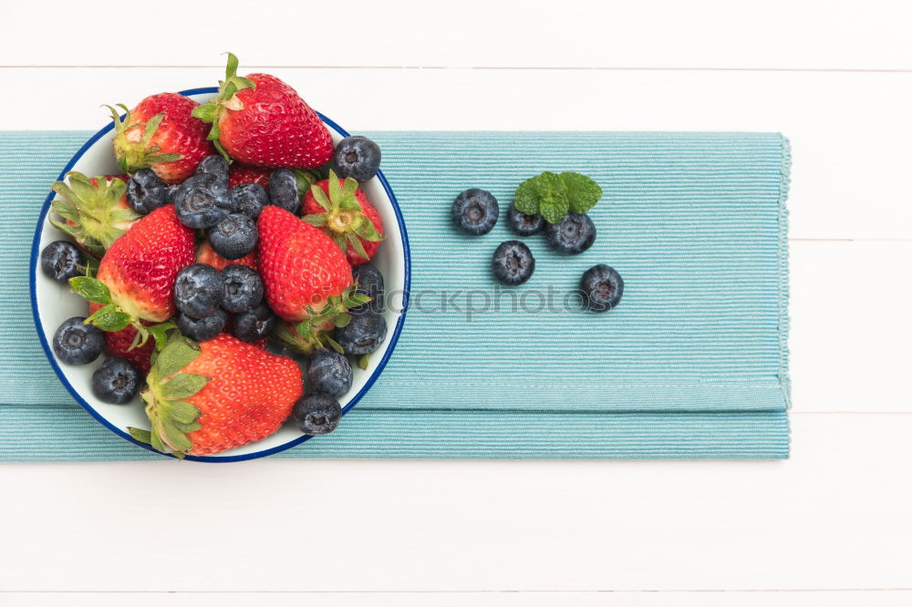 Delicious tartlets with raspberries and blueberries