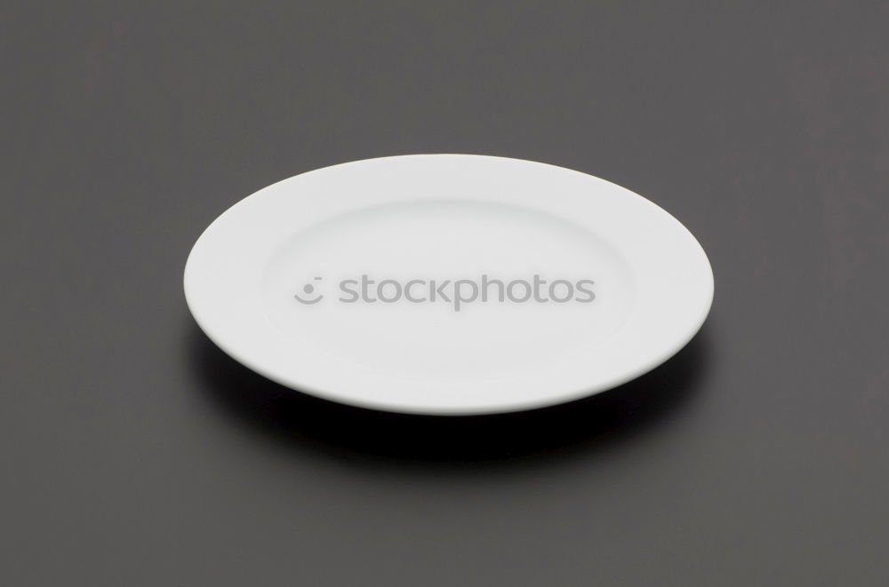 Similar – Image, Stock Photo Empty bowl on black wood in bird’s eye view