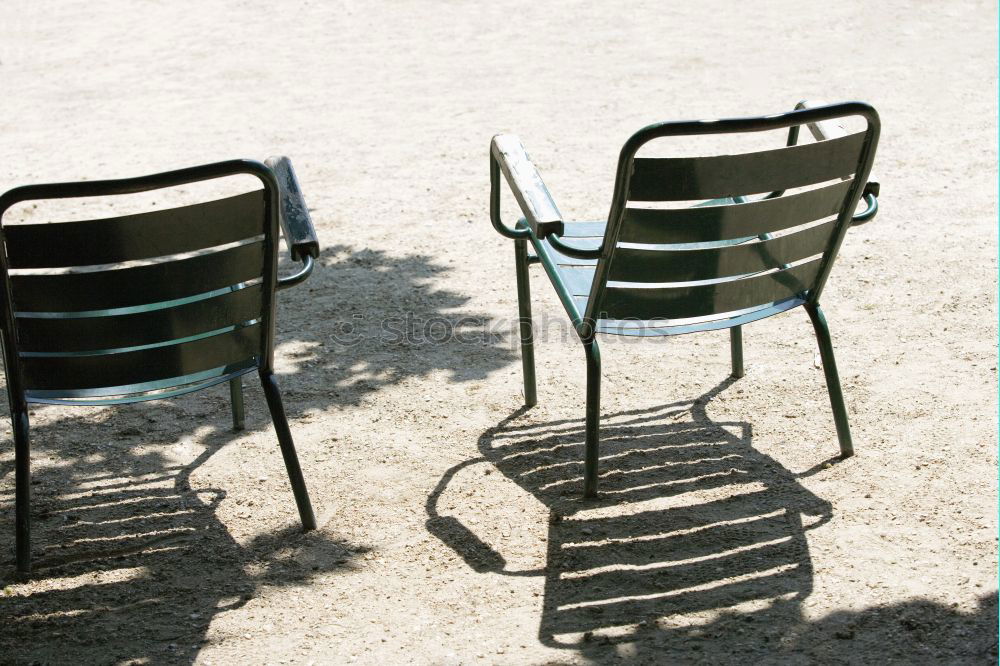 Similar – metallic chairs on the street