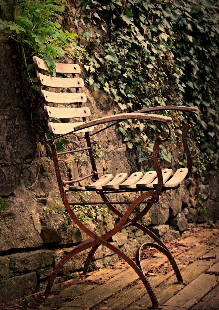 Similar – metallic chairs on the street