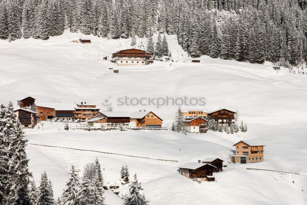 Similar – Snowfall over Austrian mountain village