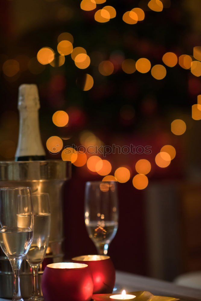 Similar – Christmas table set with biscuits and candles