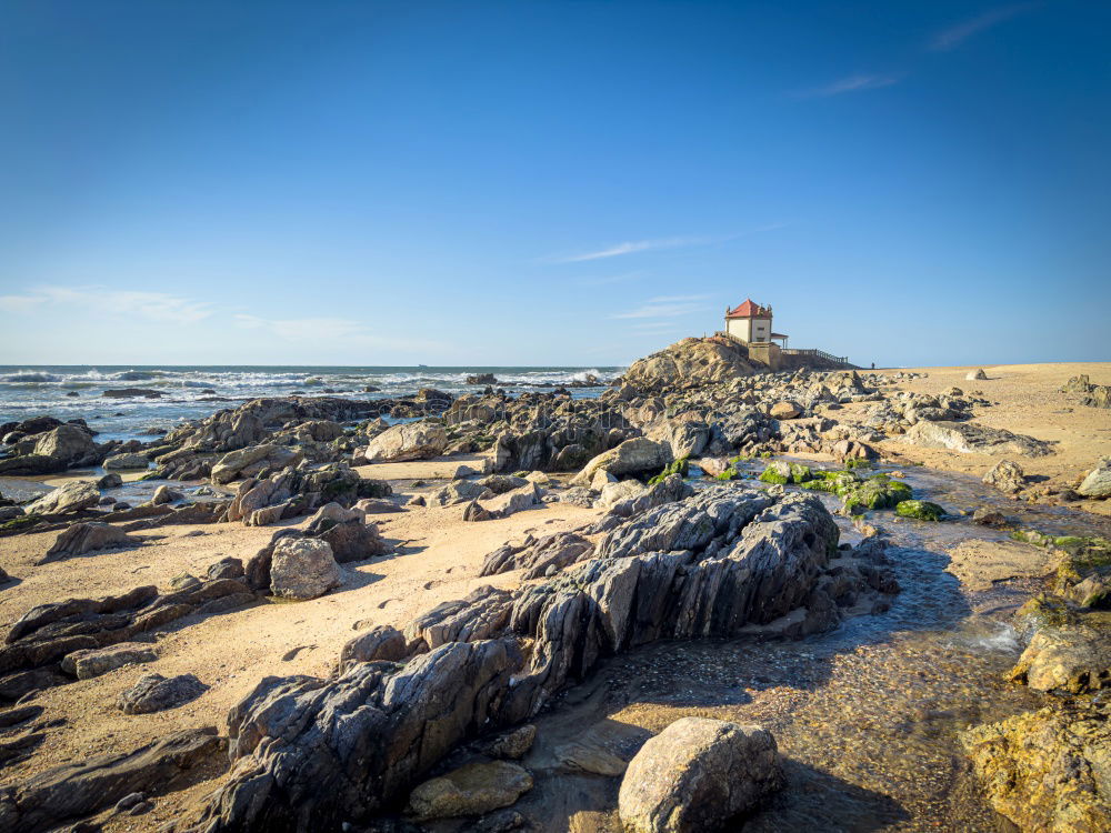 Similar – Lighthouse in Cornwall with rocks in the foreground