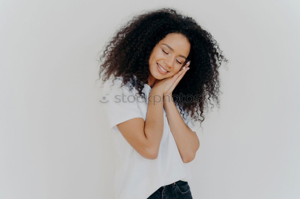 Similar – Young black woman, afro hairstyle, smiling outdoors