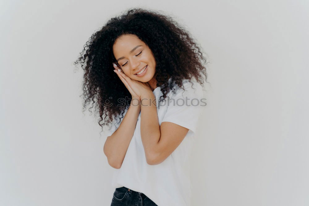 Similar – Beautiful serious thoughtful and sad black woman covering her head with sheet in bed