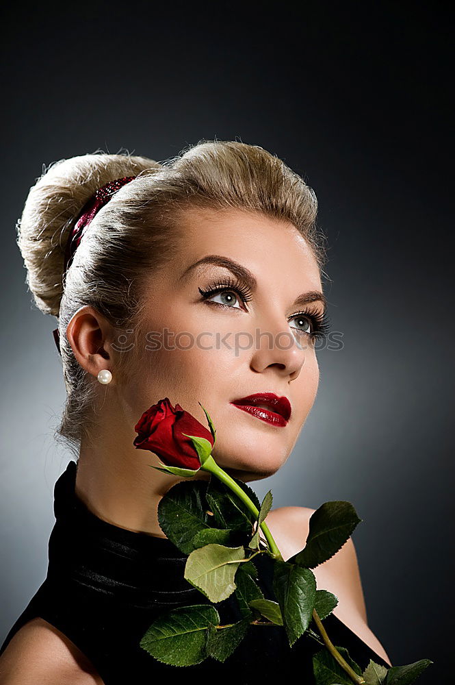 Similar – blonde young woman with flowers in background