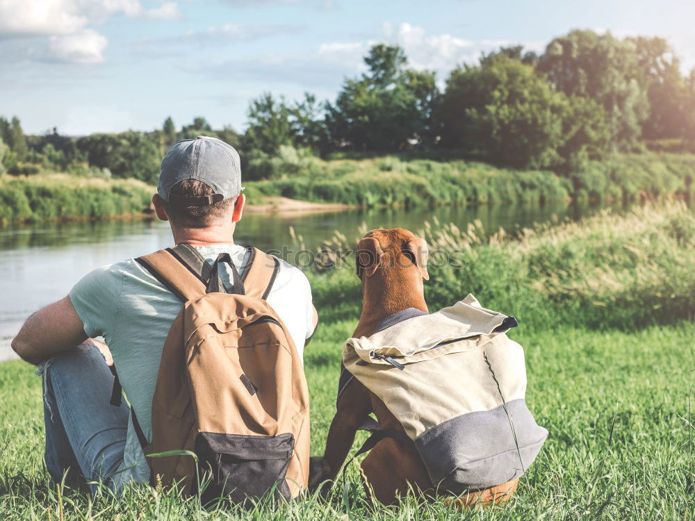 Image, Stock Photo Young woman with small dog at the lake