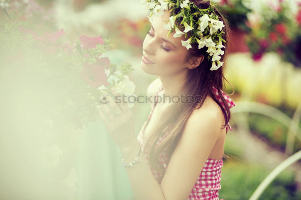 Similar – Image, Stock Photo Young woman holding a poppy flower