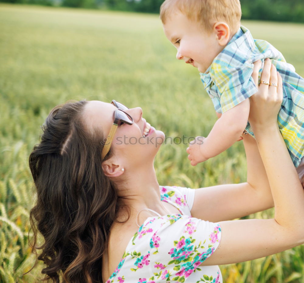 Similar – Image, Stock Photo Mother with child in park