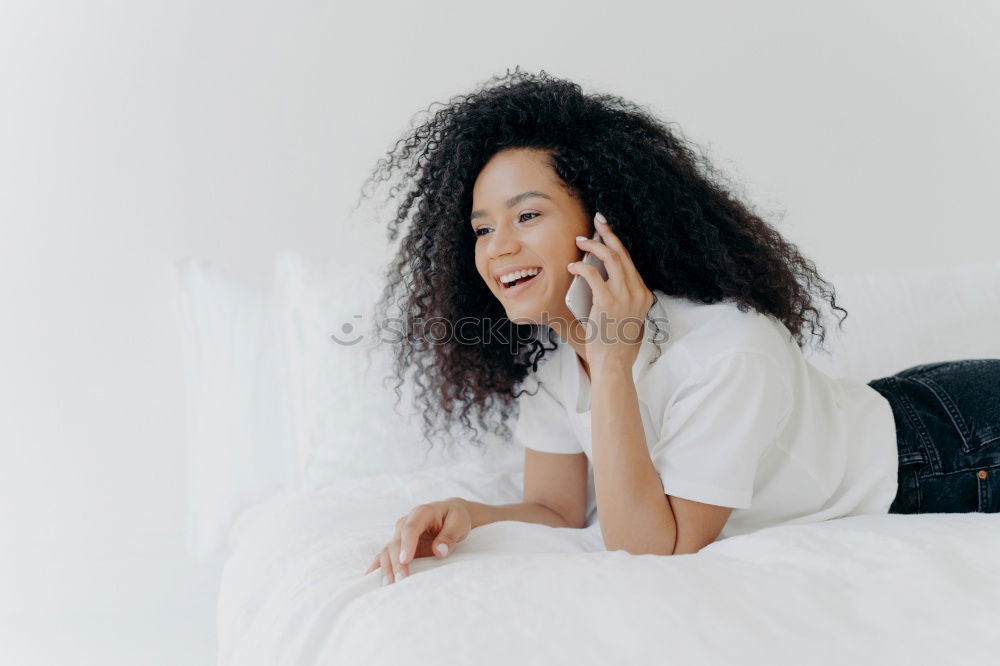 Similar – Image, Stock Photo Happy beautiful young black woman relaxed sitting in the bed