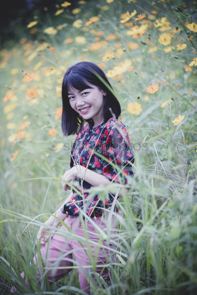 Similar – portrait of happy asian girl in nature