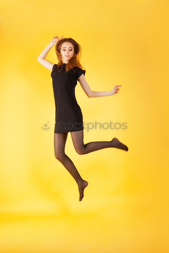 Similar – Young woman dancing in studio