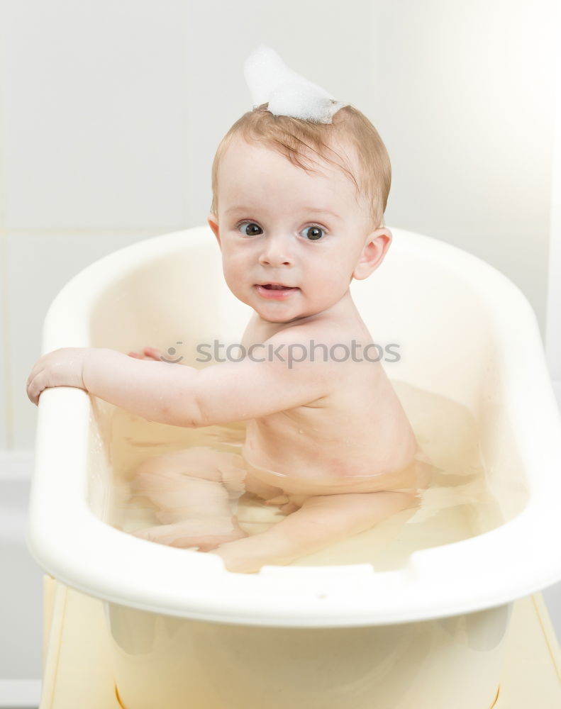 Similar – Image, Stock Photo Little baby taking shower