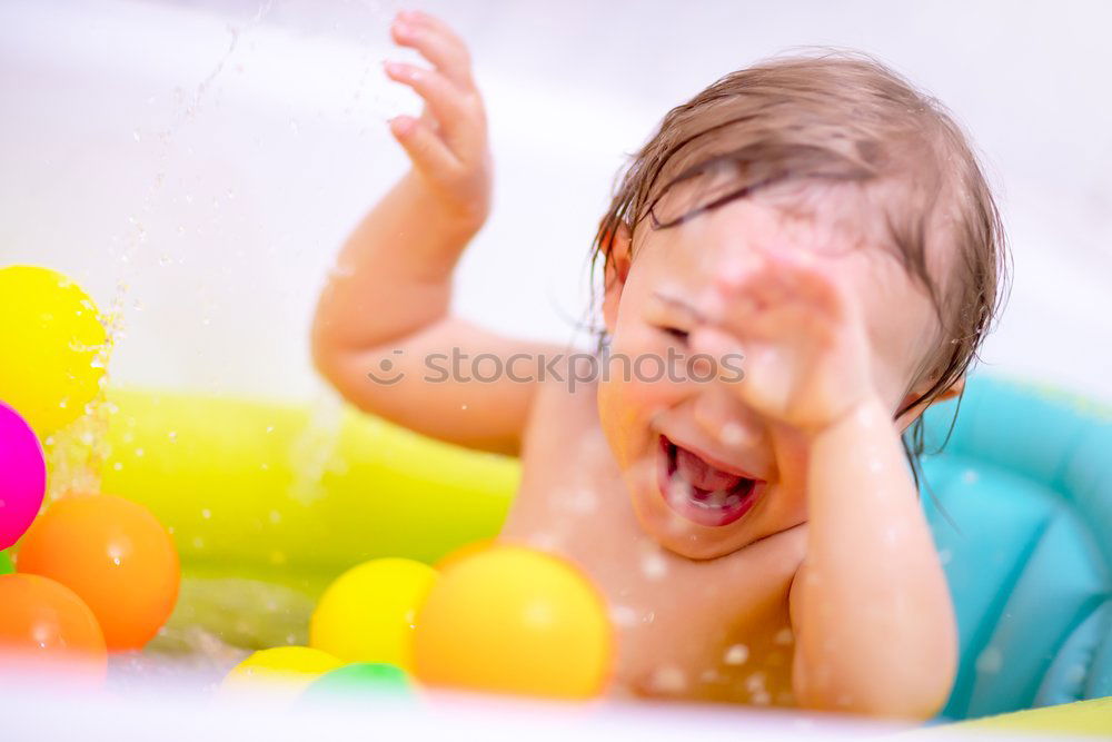 Image, Stock Photo Happy baby playing with toy blocks.