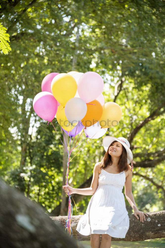 Similar – Girl with balloons