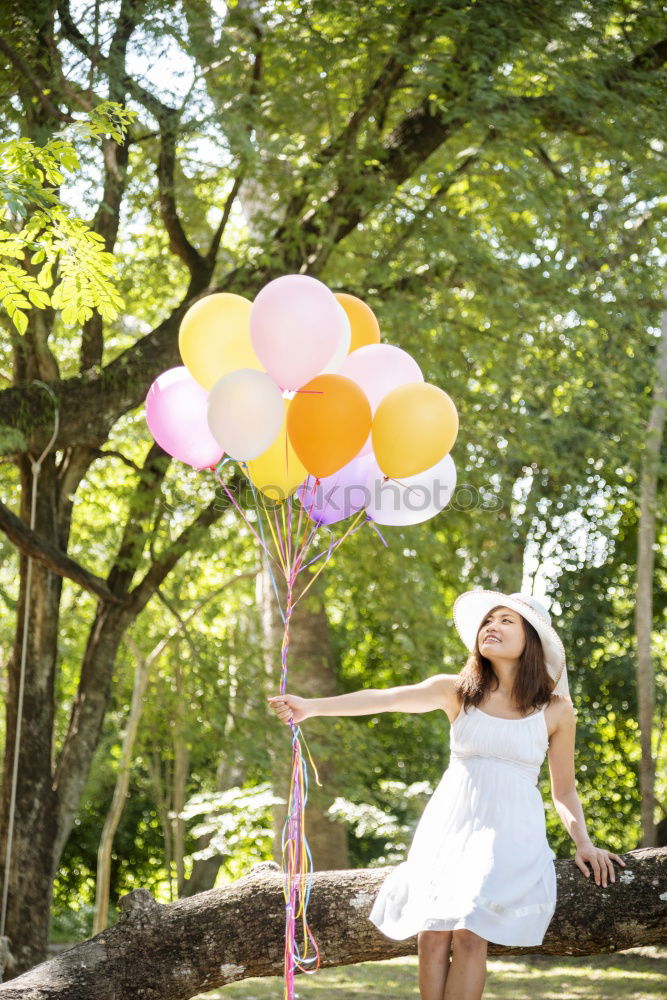 Similar – Girl with balloons