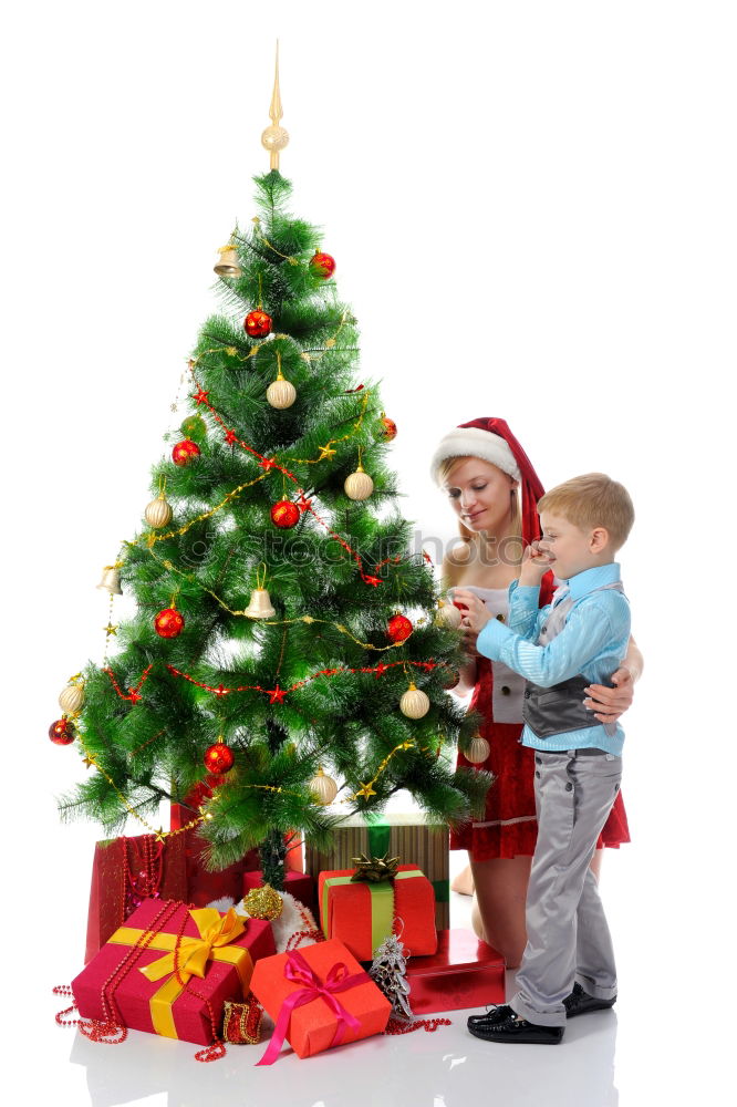 Similar – Young girl and her little sister decorating Christmas tree