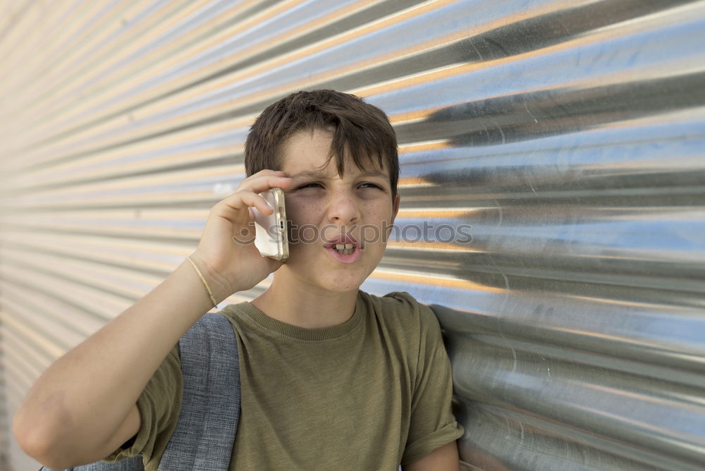 Similar – Image, Stock Photo Portrait of a young student leaning on wall while looking camera