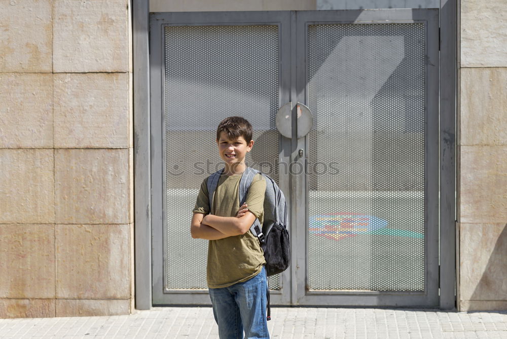 Similar – Image, Stock Photo young man waits at a wooden door and supports himself