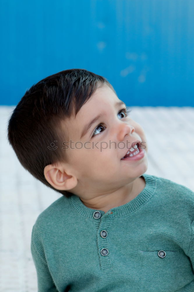 Similar – Portrait of a cute little boy on a village of an island greek