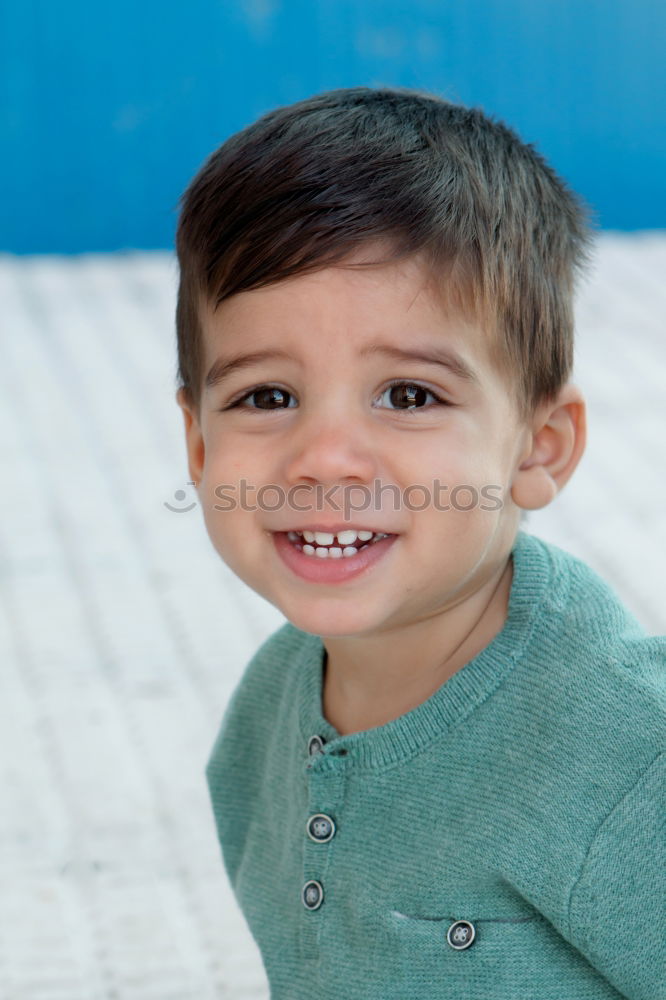 Similar – Portrait of a cute little boy on a village of an island greek