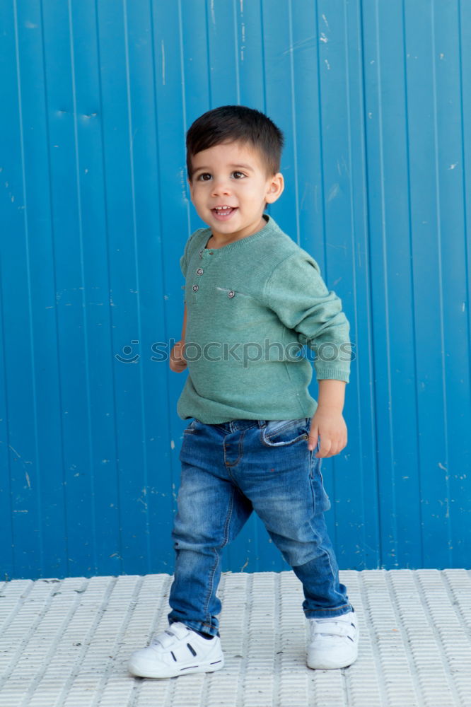 Similar – Portrait of a cute little boy on a village of an island greek