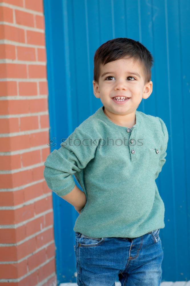 Similar – Portrait of a cute little boy on a village of an island greek