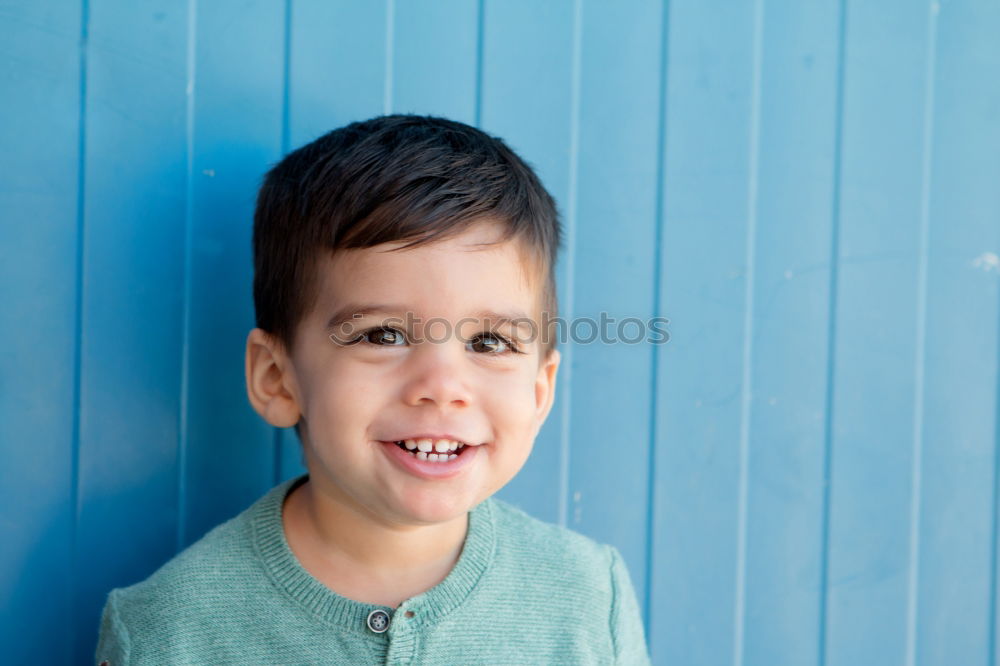 Similar – Portrait of a cute little boy on a village of an island greek