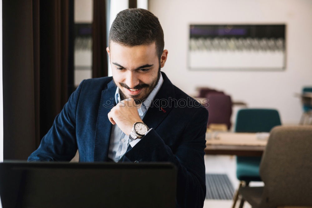 Friends using mobile and laptop