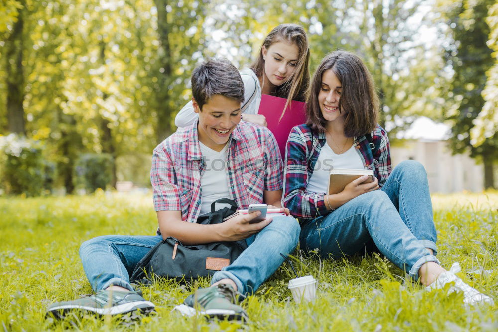 Similar – Image, Stock Photo Happy family in a urban park playing with tablet compute
