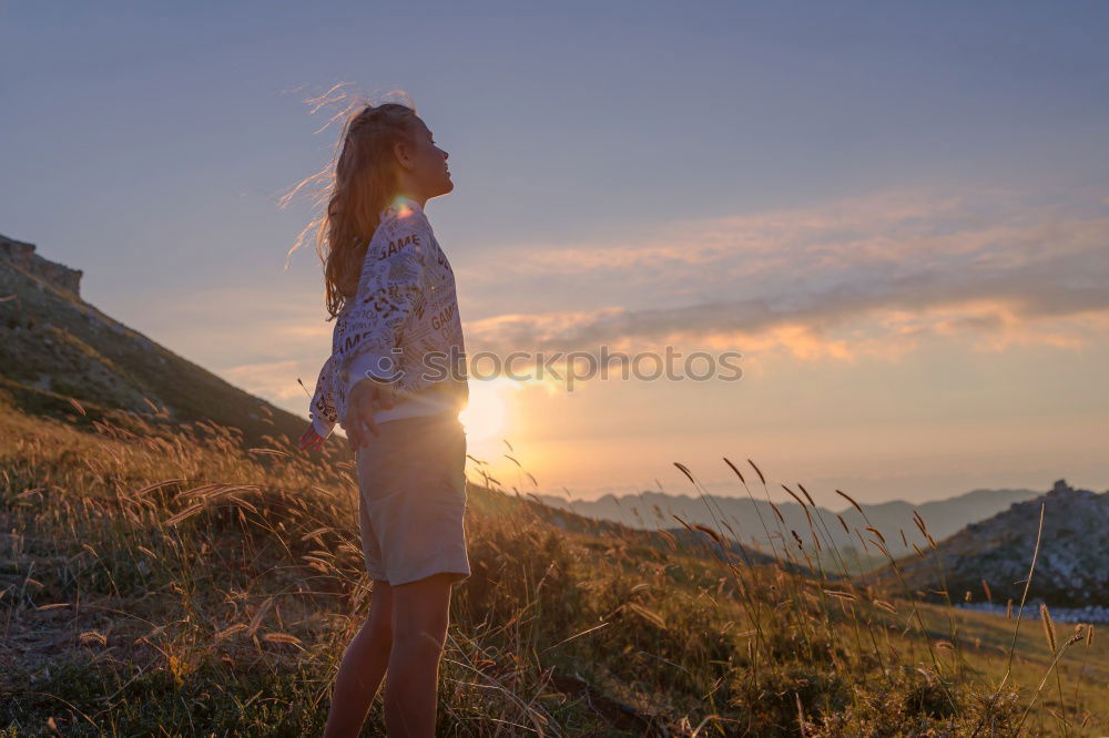 Similar – Woman standing on white cliffs by sea in England