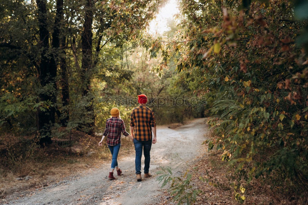 Similar – Image, Stock Photo A person?looking at autumn tree