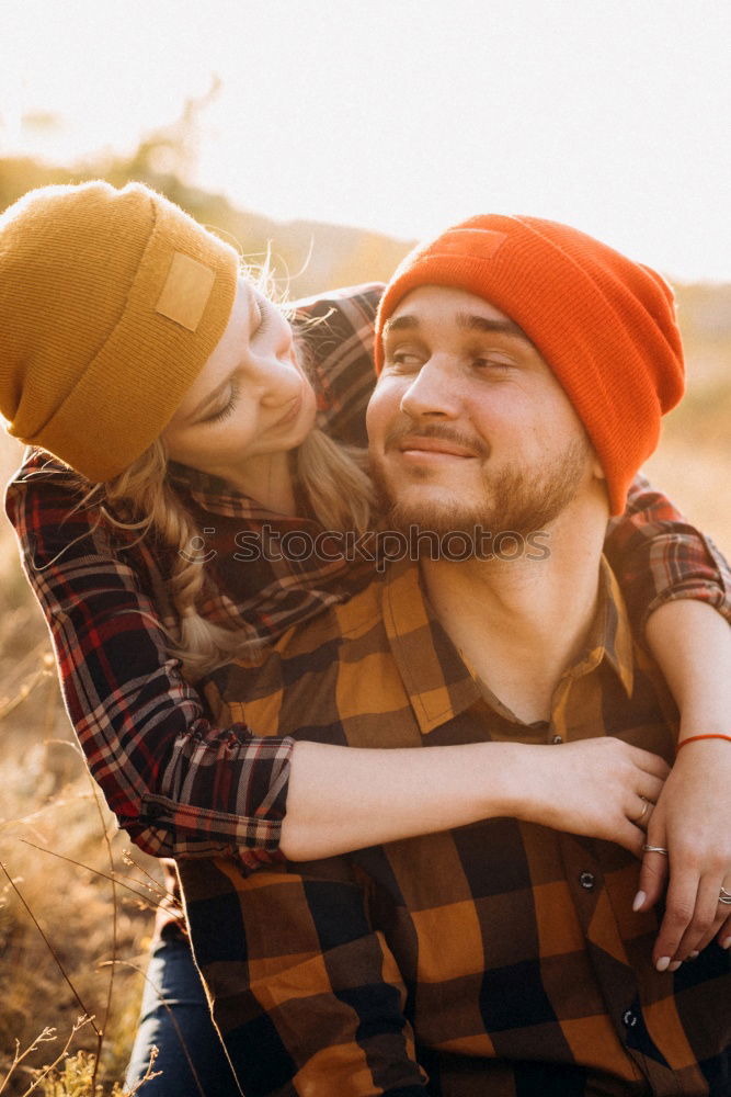 Similar – Image, Stock Photo Happy couple hugging and kissing near tree in park