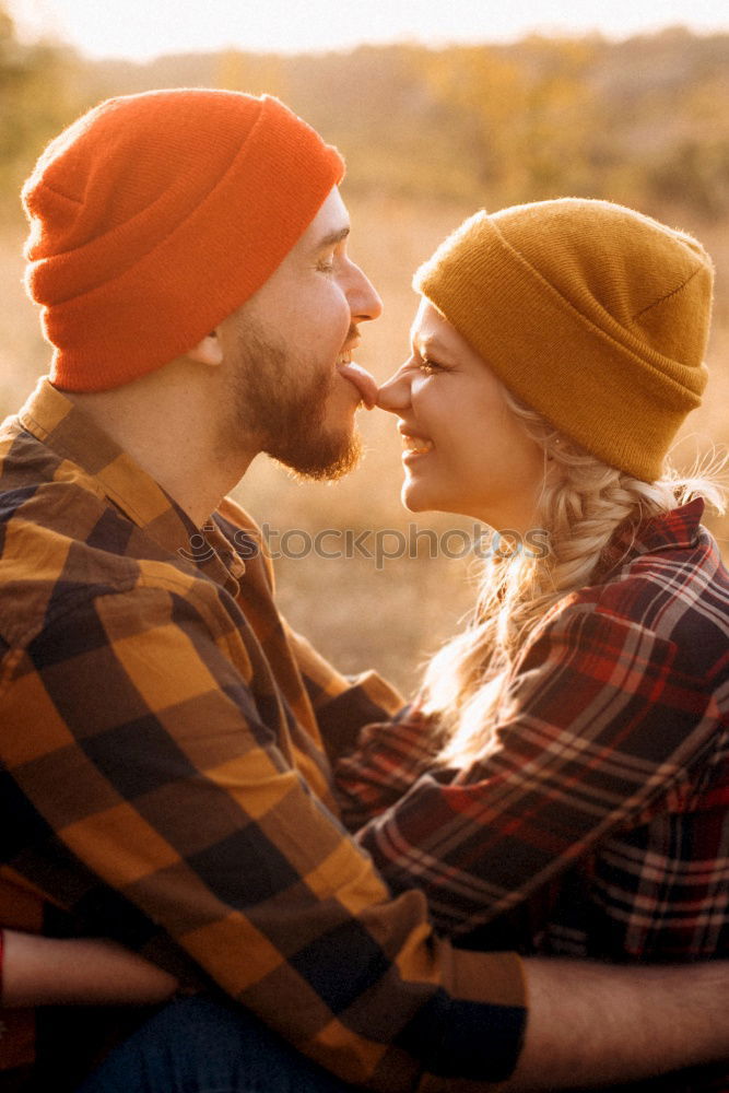 Similar – Image, Stock Photo Happy couple hugging and kissing near tree in park