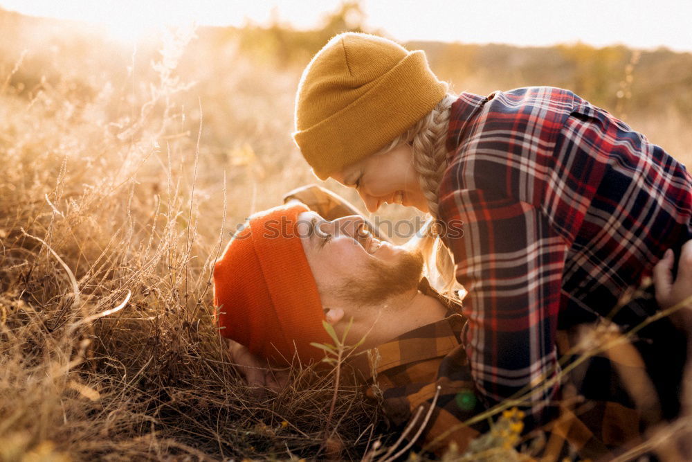 Similar – A couple of happy young people hug each other