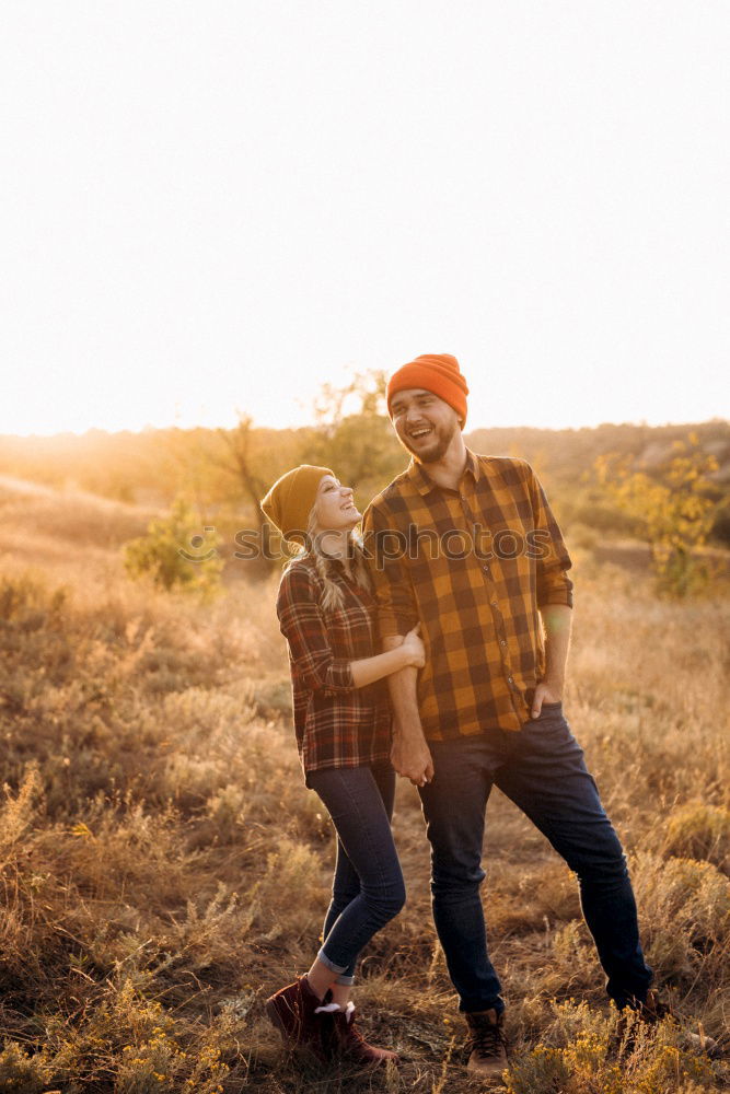 Similar – Image, Stock Photo Young woman holding hand of man and leading by a meadow