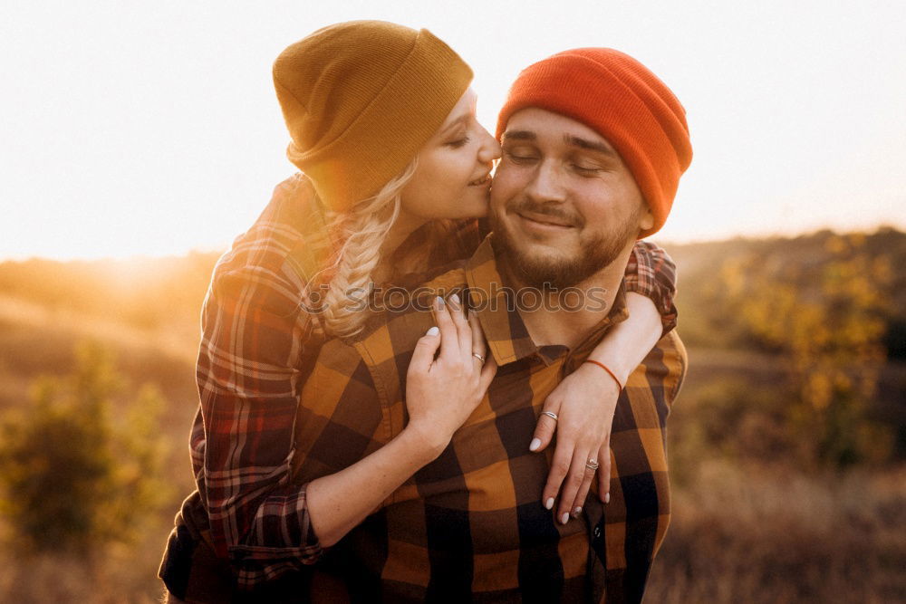 Similar – Close up of bearded man and blonde woman hugging outdoors