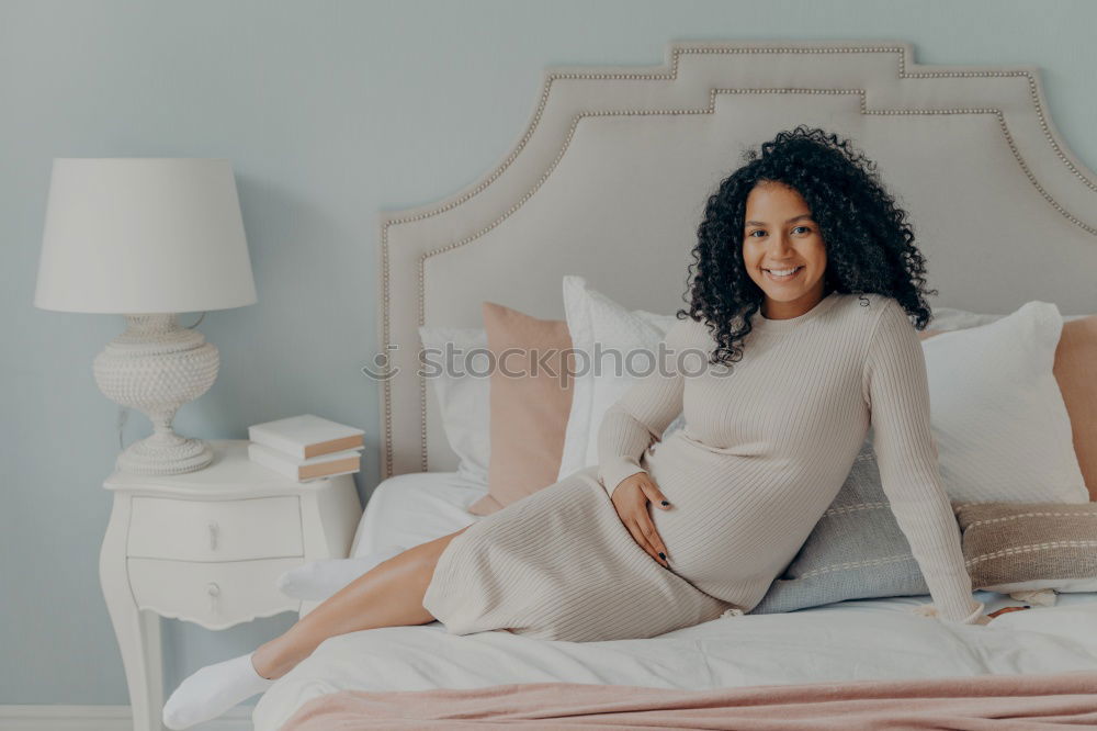 Similar – Happy beautiful young black woman relaxed sitting in the bed