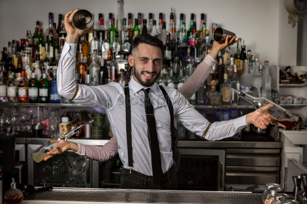 Similar – Barman is making cocktail at night club.