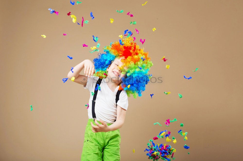 Similar – Black woman with afro hair celebrating with confetti.