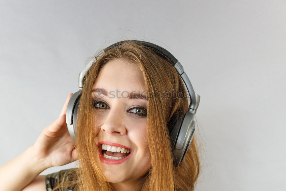 Similar – Image, Stock Photo Young blonde girl using a smartphone while sitting