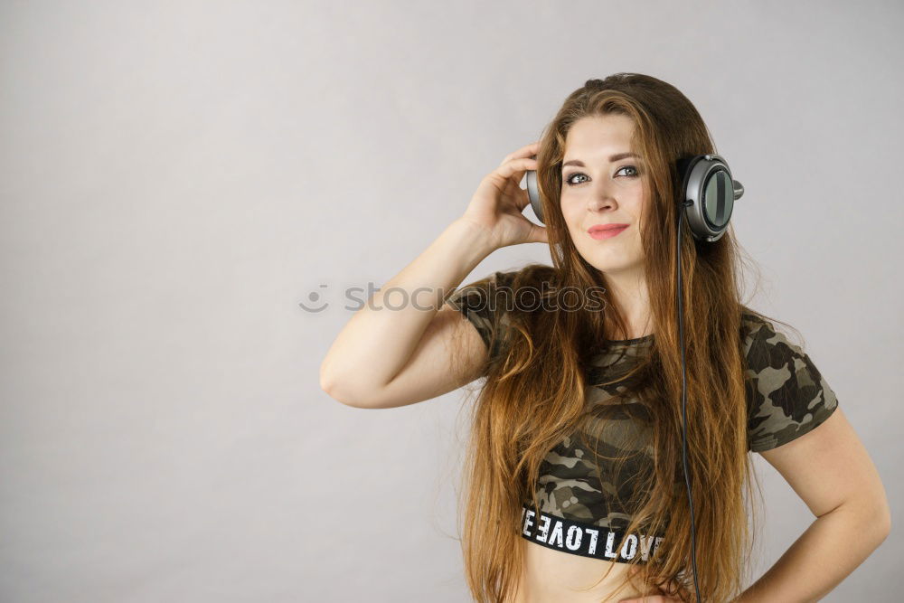 Similar – Image, Stock Photo Young girl with headphones standing on the street