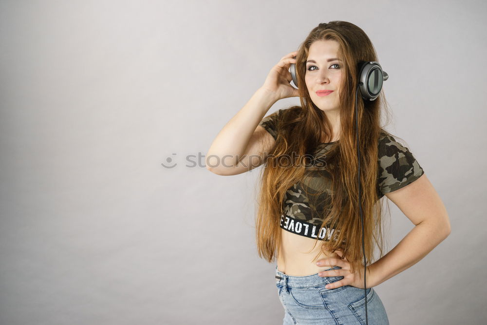 Similar – Image, Stock Photo Young girl with headphones standing on the street